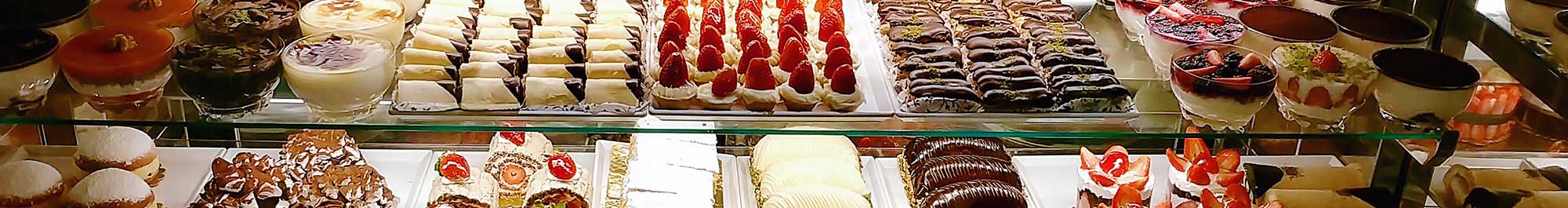 pastry case full of desserts